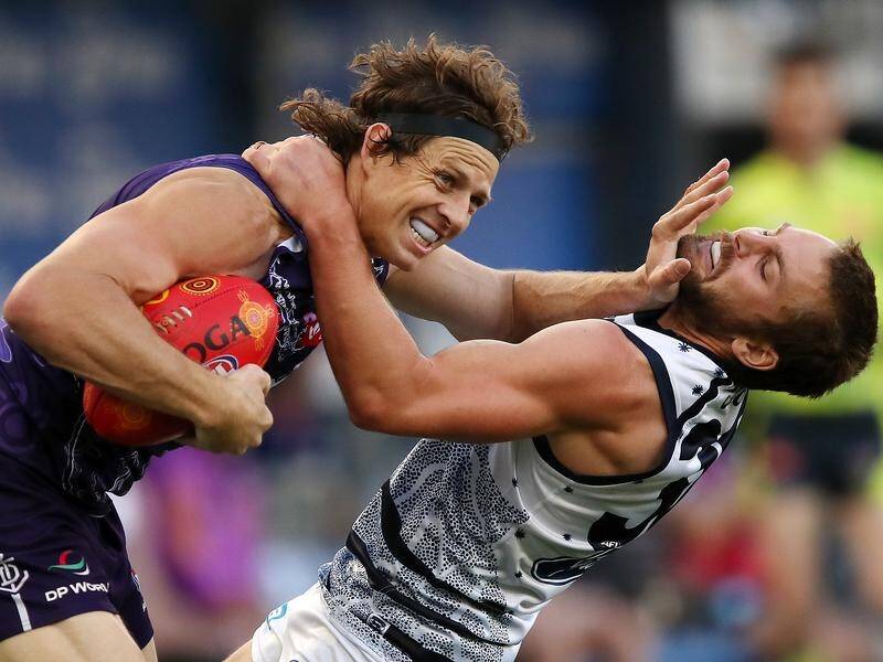 Fremantle have outmuscled reigning AFL premiers Geelong with a 29-point win in front of 45,811 fans. (Gary Day/AAP PHOTOS)