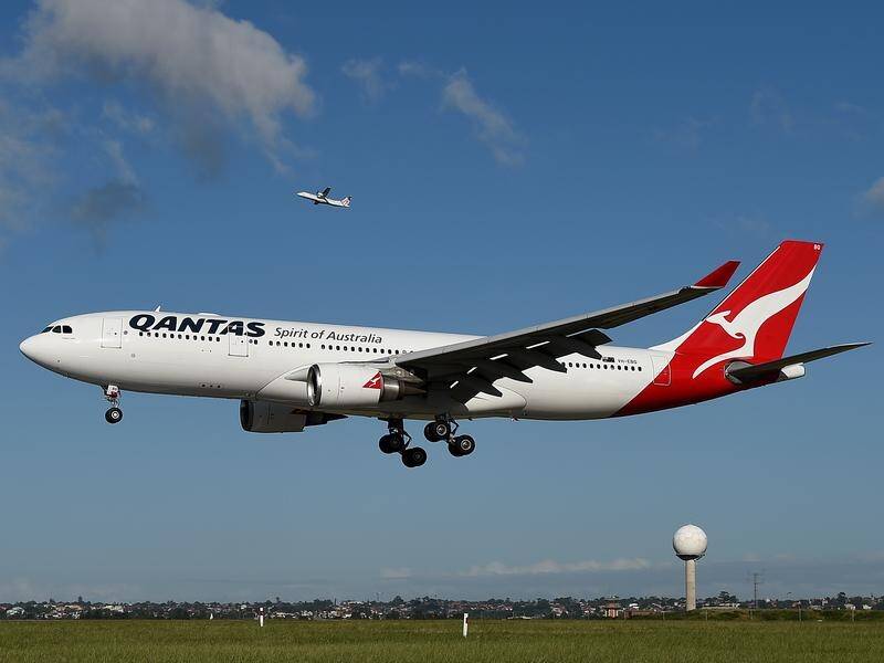 A Qantas flight from Sydney to the Philippines had to turn around after Manila airspace was closed. (Dan Himbrechts/AAP PHOTOS)