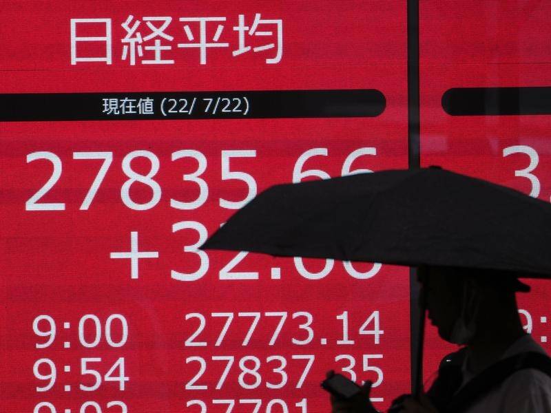 Asian markets are struggling for direction, weighed by worries over global growth. (AP PHOTO)