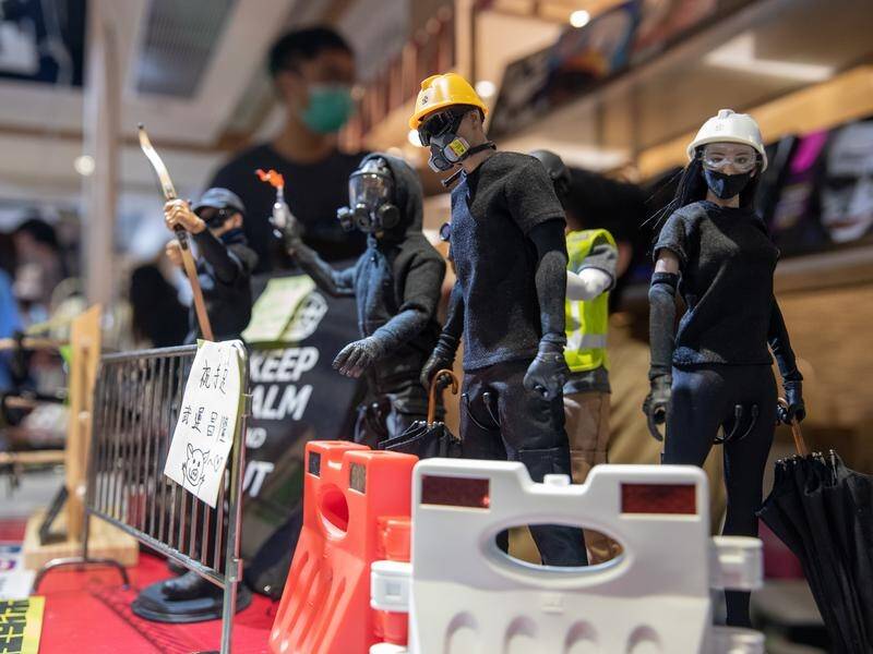 Democracy activists have been arrested in Hong Kong on charges of illegal assembly, sources say.