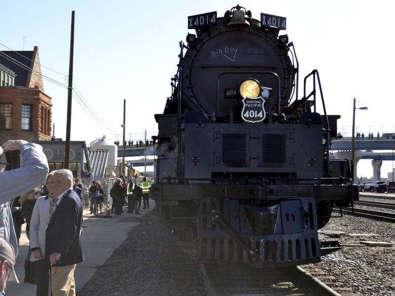 The Big Boy No. 4014 steam train rolls out of a Union Pacific restoration shop in Cheyenne, Wyoming.