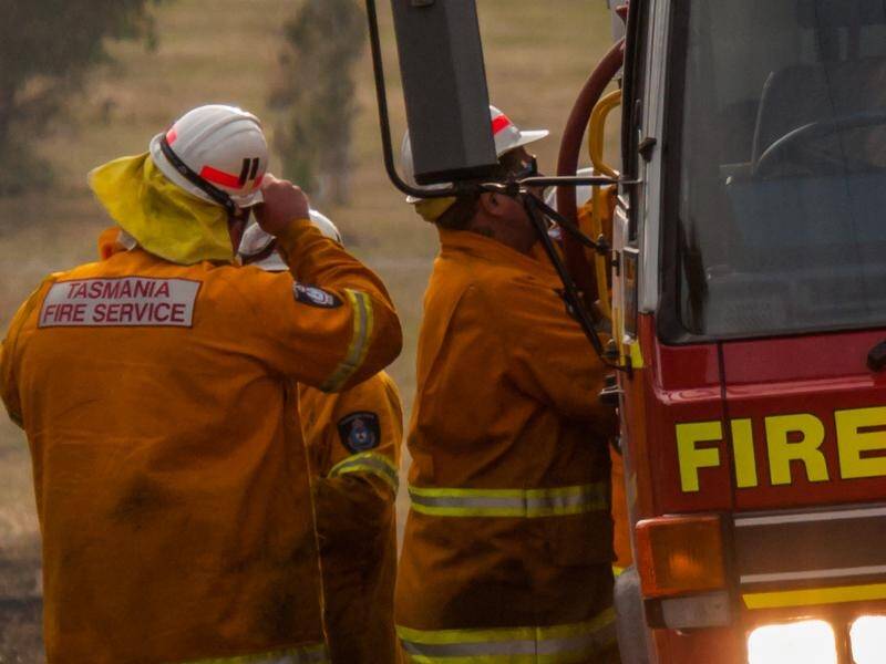 Firefighters have contained a blaze in Hobart's south after it came within metres of homes.