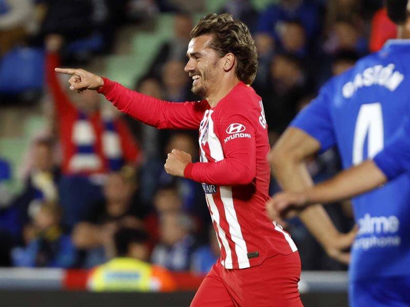 A treble from Antoine Griezmann has secured Atletico another season of Champions League football. (EPA PHOTO)