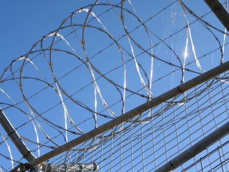 A Queensland prison under a virus lockdown has eased restrictions.