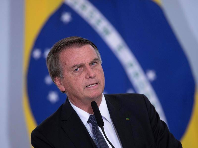 Jair Bolsonaro has criticised Brazil's health regulator for its proposed traveller vax requirement.