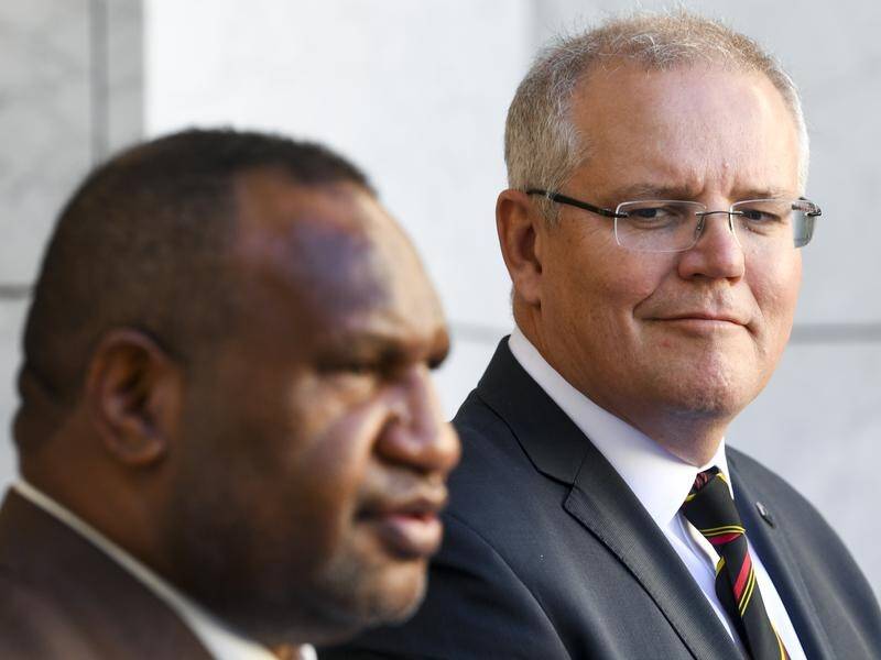 James Marape (left) and Scott Morrison will hold a virtual summit to discuss regional issues.
