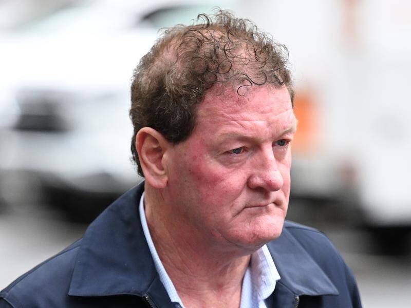 Former AFL player manager Ricky Nixon has been accused of kneeing a police officer in court. (James Ross/AAP PHOTOS)