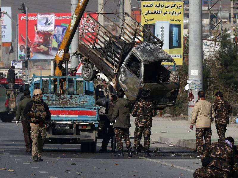 Authorities say "terrorists" mounted the rockets in a small truck and set them off in Kabul.