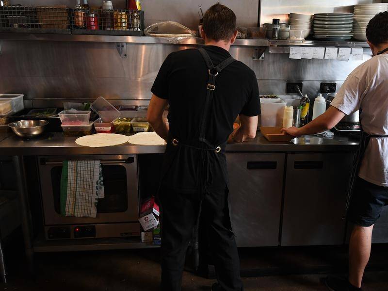 A Melbourne restaurant is being charged with wage theft, over pay withheld from four young staff. (Dan Peled/AAP PHOTOS)