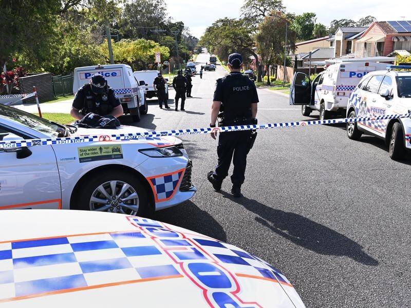 Police have set up a crime scene near Corinda State School in Brisbane after a man was shot dead. (Darren England/AAP PHOTOS)