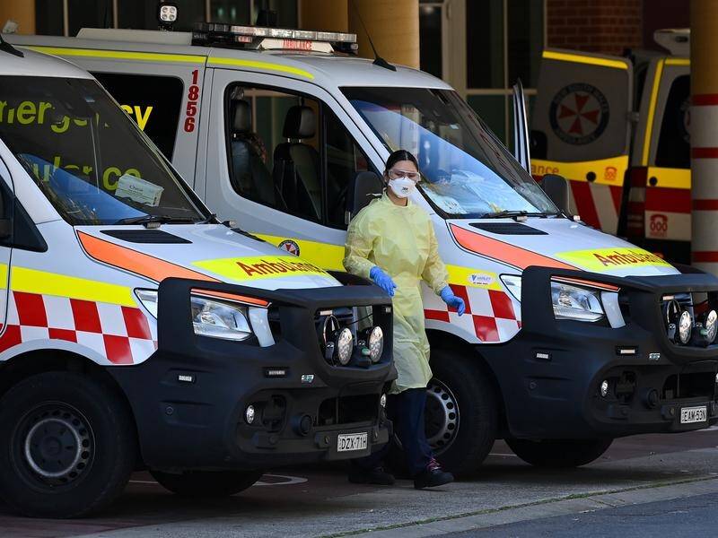 A third COVID wave and rampant winter flu season are putting NSW health resources under stress. (Bianca De Marchi/AAP PHOTOS)