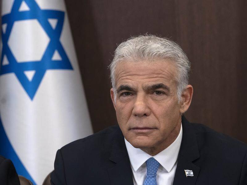 Israeli Prime Minister Yair Lapid says all steps will be taken to protect the country's security. (AP PHOTO)