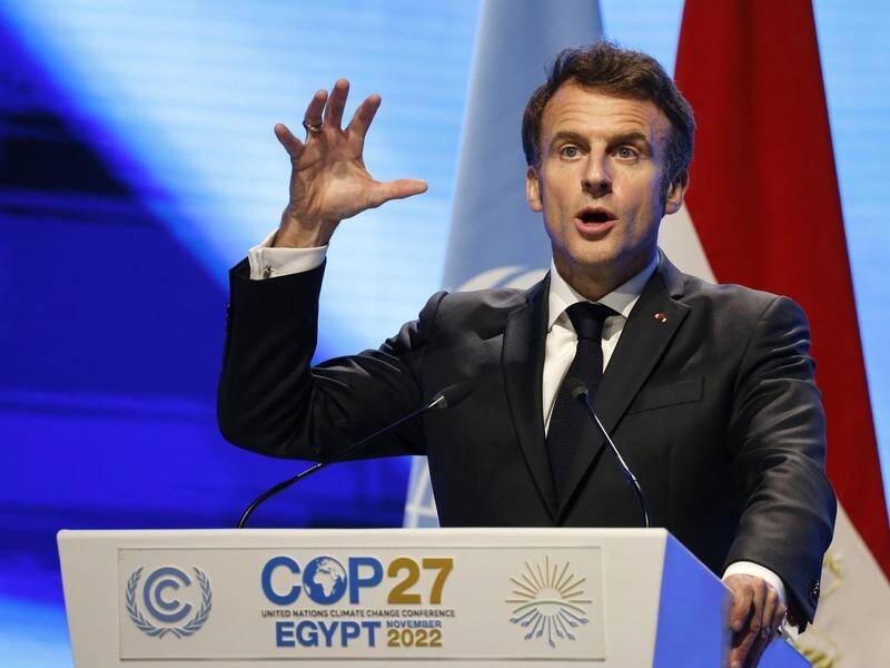 French President Emmanuel Macron says climate commitments must be upheld despite the war in Ukraine. (AP PHOTO)