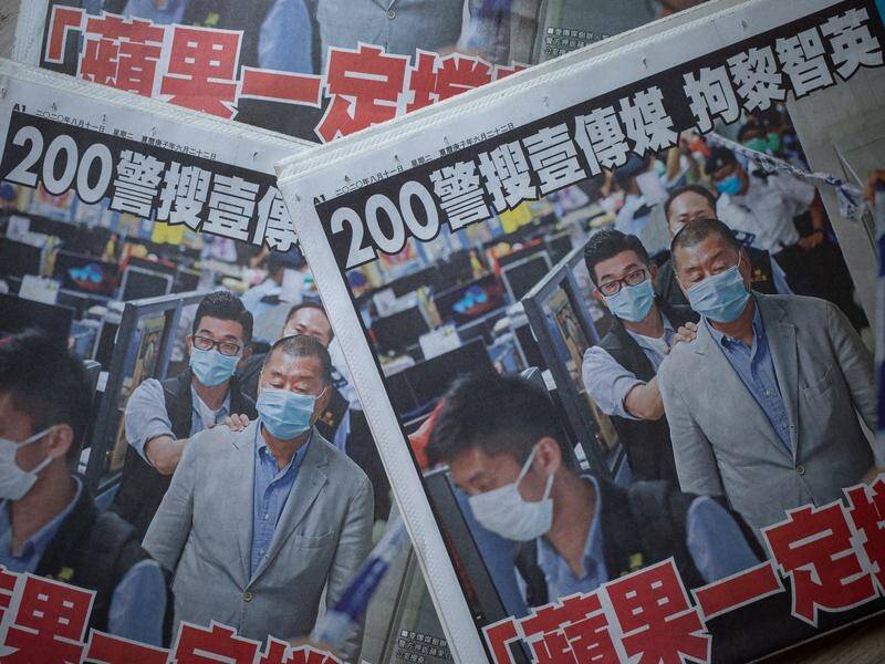 Hong Kong's Apple Daily newspaper has vowed to "fight on" after the arrest of owner Jimmy Lai.