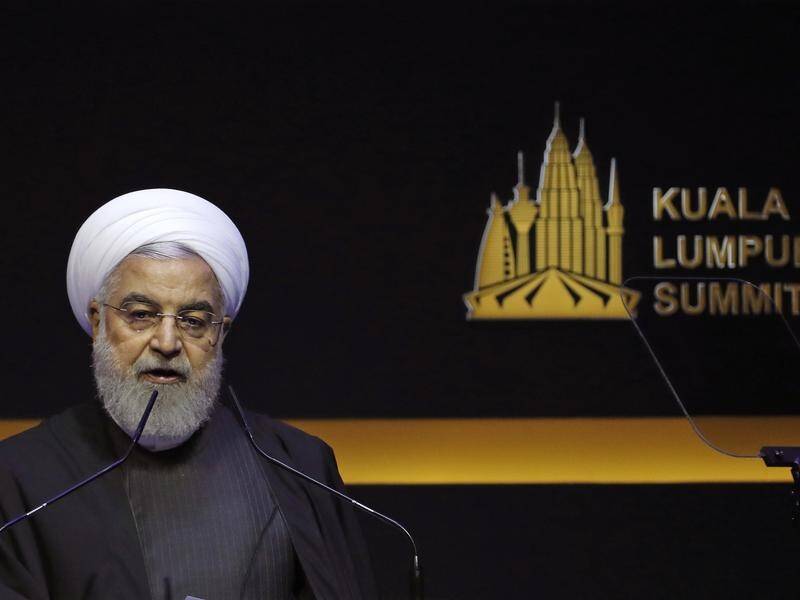 Iranian President Hassan Rouhani says the US uses economic sanctions to bully other countries.