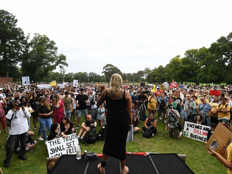 An anti-vaccine rally in Melbourne started peacefully but protesters later clashed with police.
