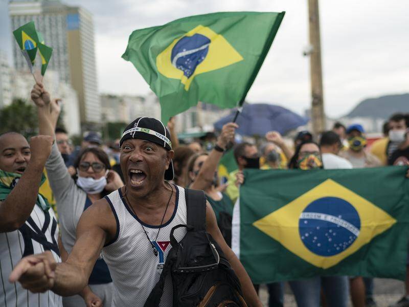 Brazil has recorded more than 37,000 deaths, but protesters are supportive of the president.