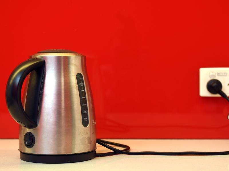 A public servant has been sacked for urinating into a kitchen kettle used by fellow workers.