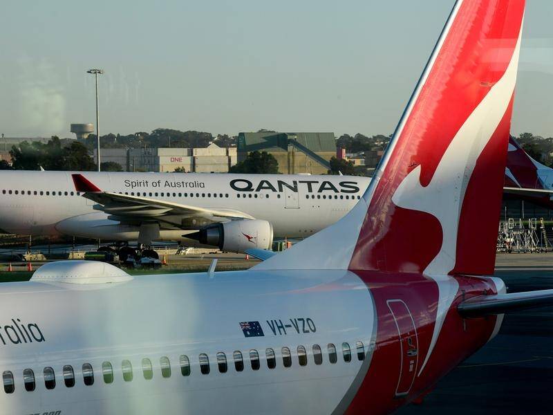 Authorities are racing to work out how a Qantas crew member became infected with coronavirus.