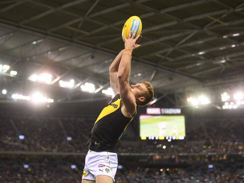 The AFL will keep Marvel Stadium's roof closed during day games to eliminate sun glare.