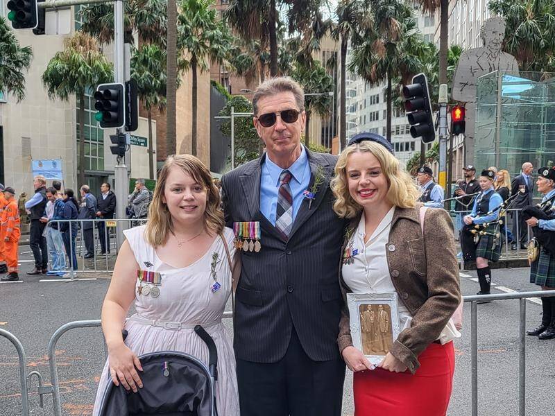 Rachel Maddox, Wayne Everett and Jess Everett at the Anzac Day parade in Sydney.