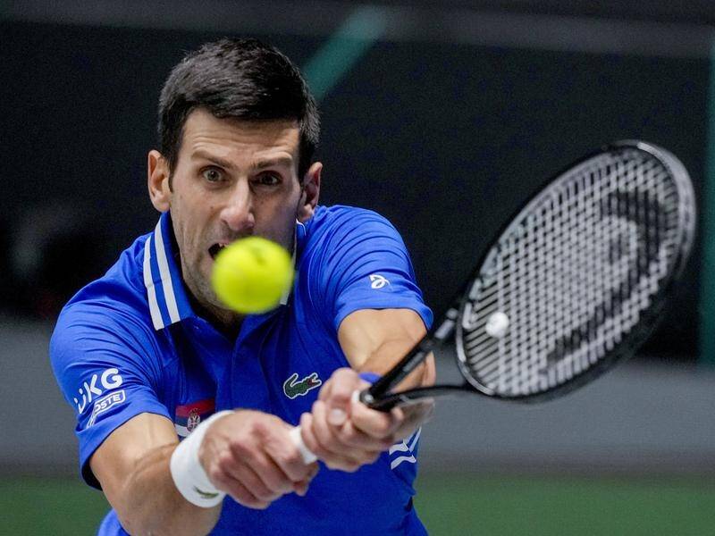 Novak Djokovic was all focus as he led Serbia to a 3-0 win over Austria in the Davis Cup finals.