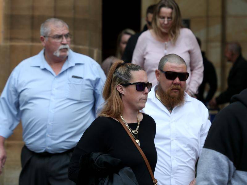 Family members of Suzanne Poll leave the Adelaide Magistrates Court in Adelaide in 2019.
