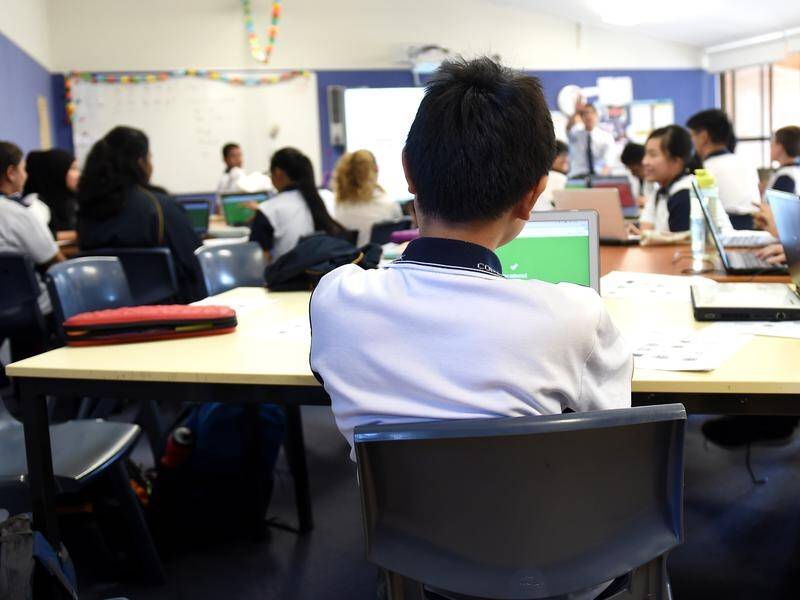 NSW teachers have one of the best retention rates in the public service, second only to police. (Paul Miller/AAP PHOTOS)