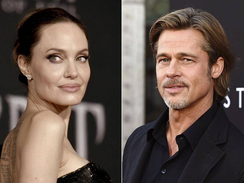 Angelina Jolie filed for divorce from fellow Hollywood actor Brad Pitt (right) seven years ago. (AP PHOTO)