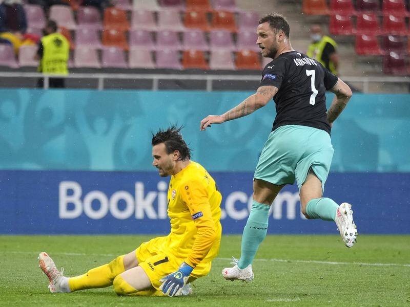 Marko Arnautovic scoring Austria's decisive third goal in the 3-1 victory over North Macedonia.