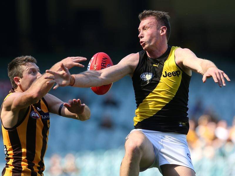 Dylan Grimes will miss Richmond's blockbuster with Geelong after suffering a delayed concussion.