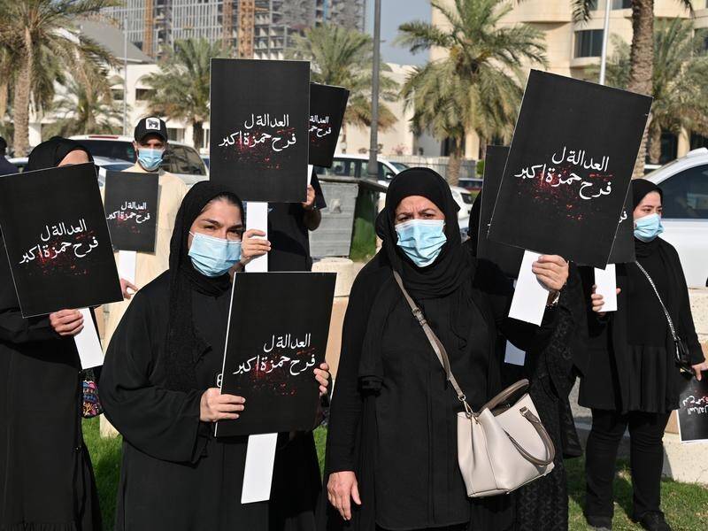 Kuwaiti have carried placards saying "Justice for Farah Hamza Akbar" at a protest in Kuwait City.