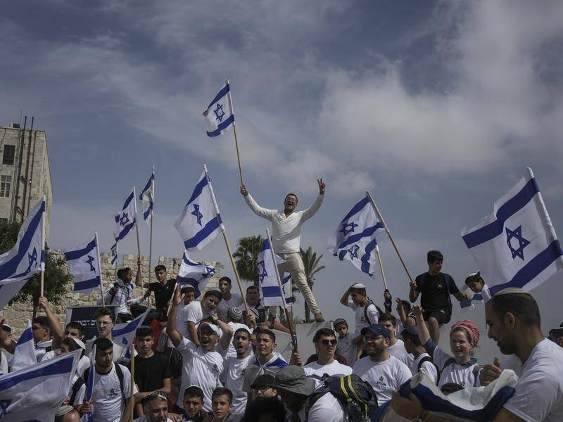 Israeli nationalists waved flags and chanted during a march marking Jerusalem Day. (AP PHOTO)