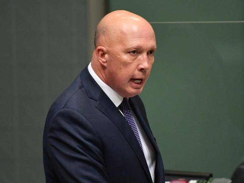 The government had to act in Australia's national interest over nuclear subs, Peter Dutton says.