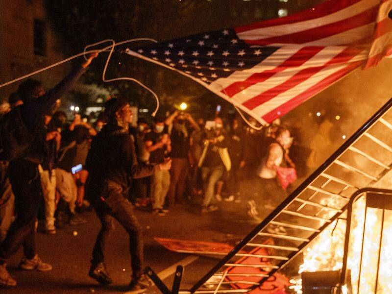 The United States is struggling to contain violence linked to demonstrations over race and policing.