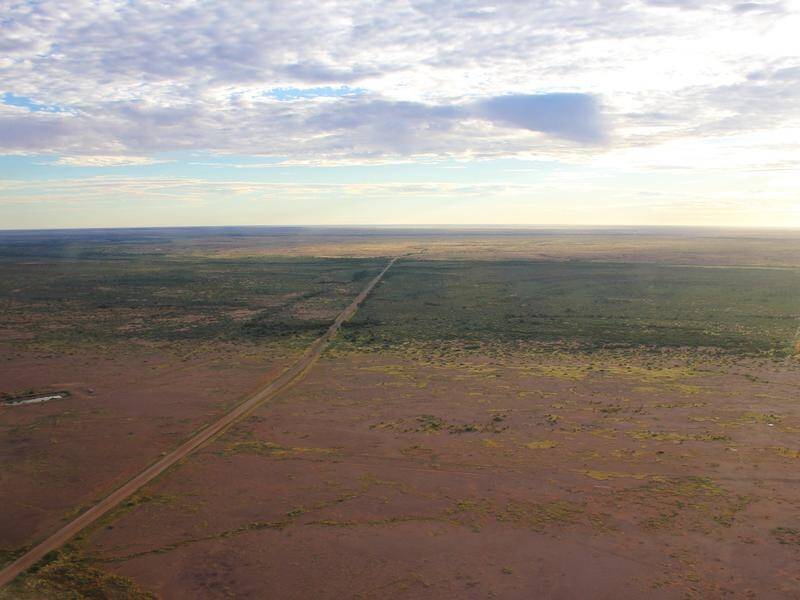 More heavy rainfall is expected in northern Queensland as recent floodwaters flow to Lake Eyre .