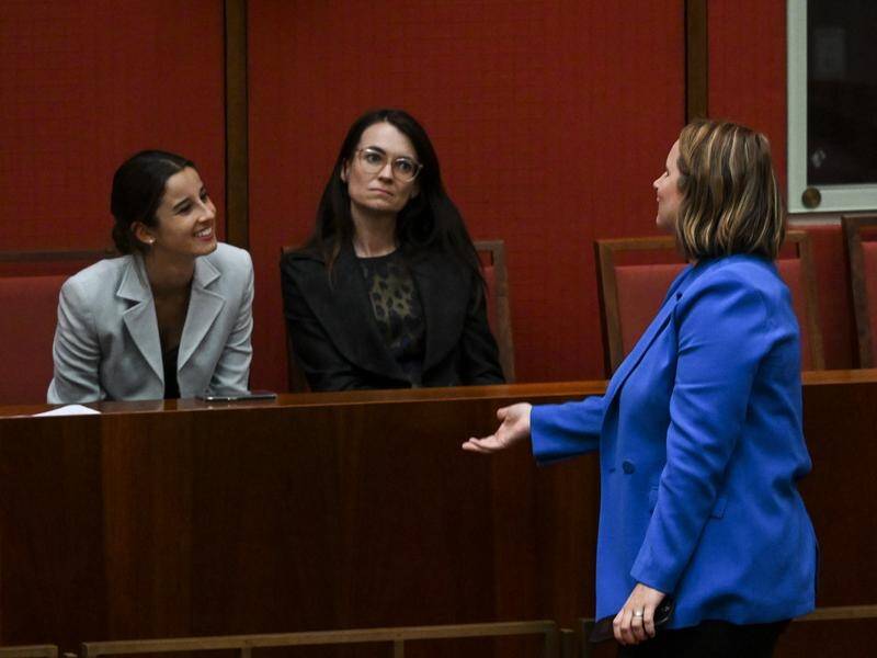 Labor senator Nita Green talked with advocate Chanel Contos (L) after speaking on the inquiry. (Lukas Coch/AAP PHOTOS)