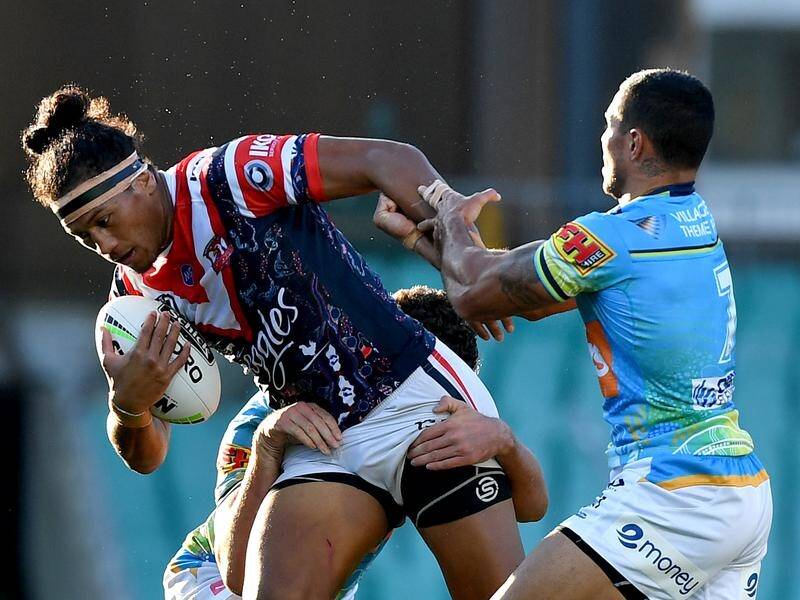 The Sydney Roosters have held a determined Gold Coast at bay in an 18-12 NRL win at the SCG.