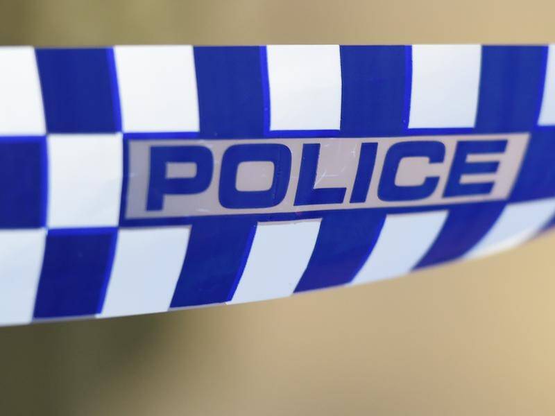 A woman has been charged with being an accessory after the fatal shooting of a driver in Queensland. (Tracey Nearmy/AAP PHOTOS)