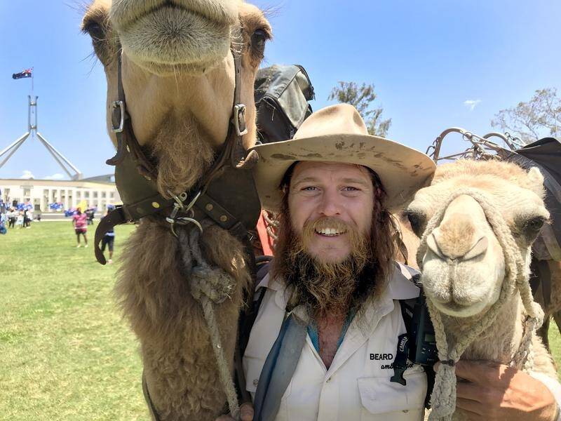 John Elliott and his camels trekked across Australia to raise awareness about skin checks.