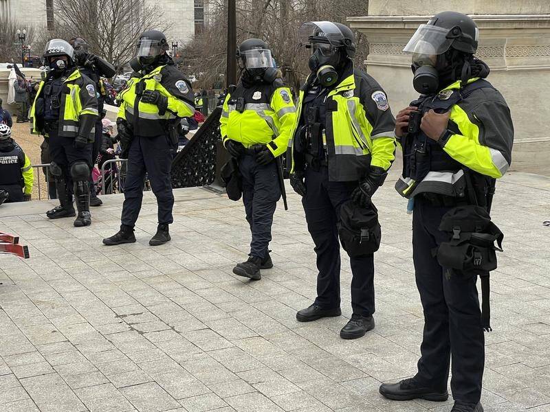 Capitol police officers may face disciplinary action over their behaviour during the January 6 riot.