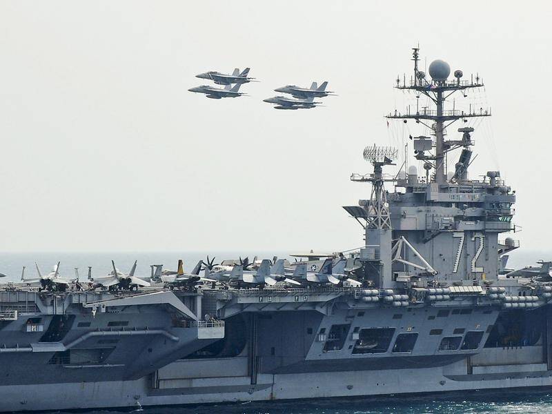 Aircraft carrier USS Abraham Lincoln will be deployed to the Middle East as a warning to Iran.