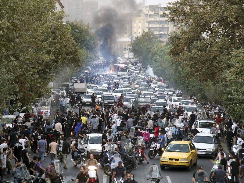 The EU and England have sanctioned Iranian officials after Tehran cracked down on protests. (AP PHOTO)