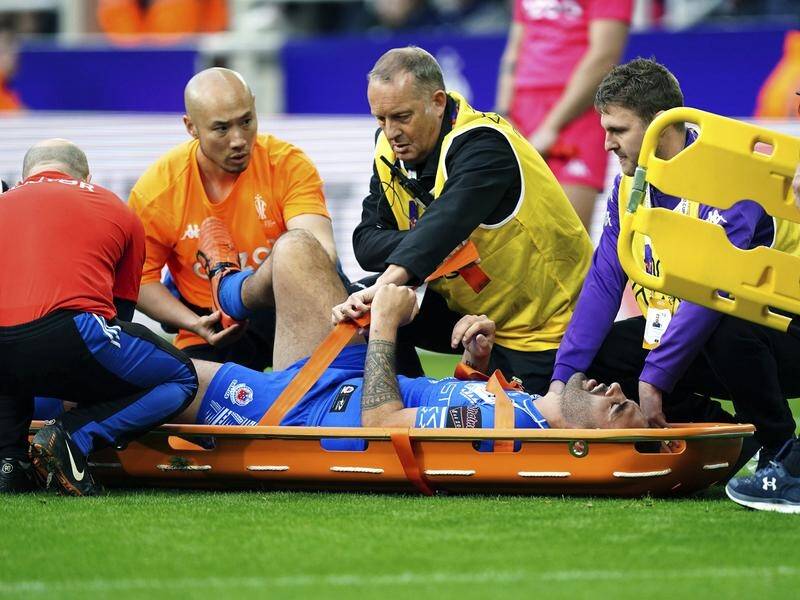Samoa's Tyrone May is taken off the pitch in a stretcher during their calamitous World Cup opener. (AP PHOTO)