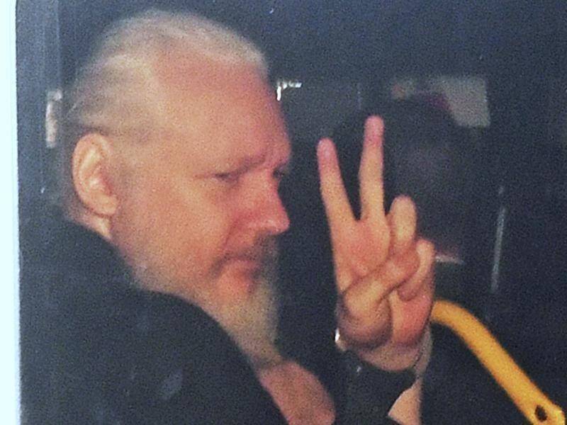 Julian Assange was arrested at the Ecuadorean embassy and taken to court where he was charged.