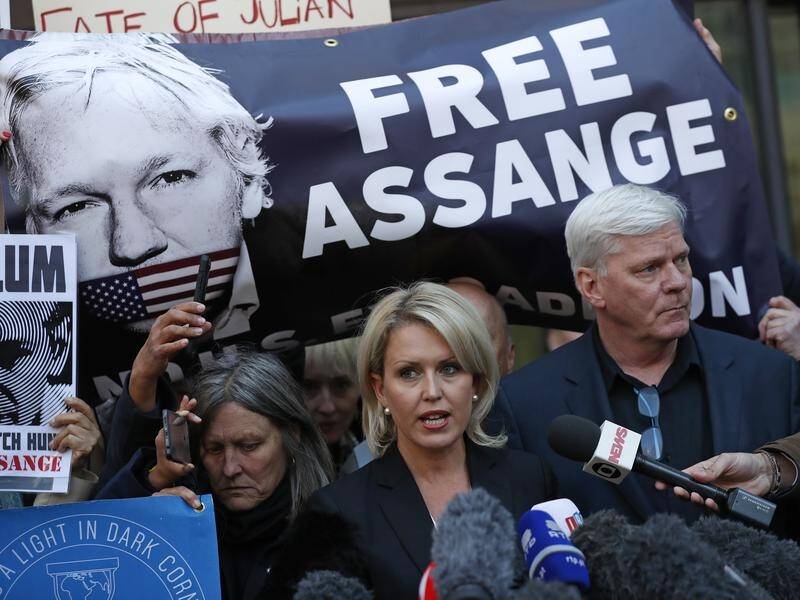 Jennifer Robinson (C) says Ecuador has made "outrageous allegations" against Julian Assange.