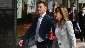 A security officer has denied calling Tom Starling's mother Joanne, pictured with him, a slut.