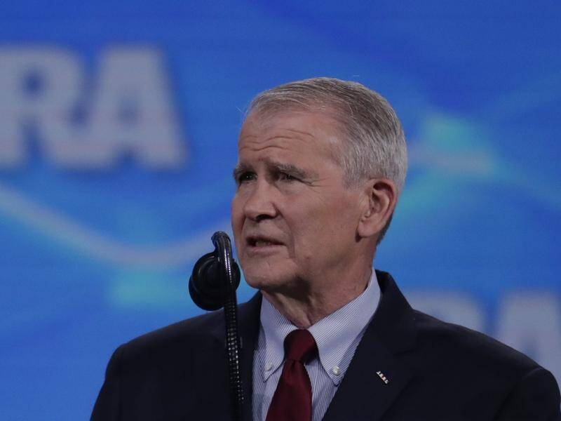 NRA president Oliver North is stepping down amid a public feud with chief executive Wayne LaPierre.
