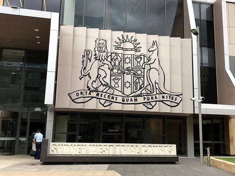 A driver is on trial for manslaughter after an allegedly unrestrained baby died in a crash.