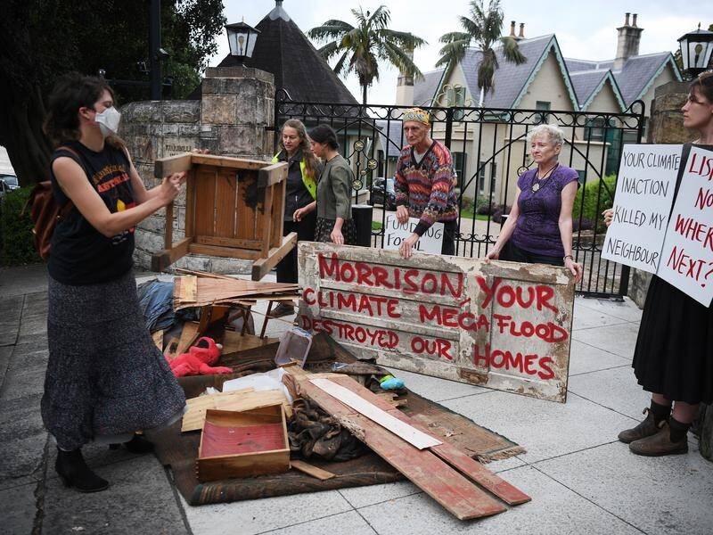 Lismore residents impacted by the NSW floods have dumped debris at Kirribilli House in protest.